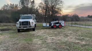 Loading Bees using a Bobcat