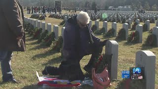 Volunteers place wreaths in Suffolk cemetery