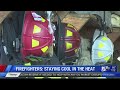 Firefighters battling fires, temperatures