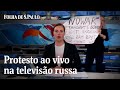 Funcionária de TV faz protesto contra guerra no principal telejornal russo | CENAS DA GUERRA