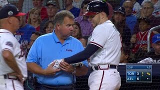 TOR@ATL: Freeman shaken up on overturned HBP call