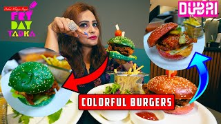 Colorful Burgers buns with crunchy chicken in Luna Blu Restaurant Dubai - Green and Pink Burgers 🍔🍔