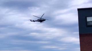 Homeland Security (NNSA) Helicopter flies between skyscrapers in Boston.