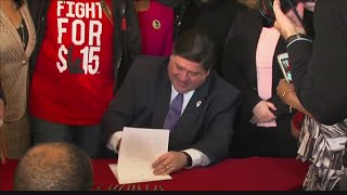 Illinois Governor signs bill that would raise minimum wage to $15/hr by 2025