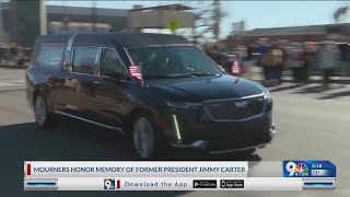 Georgians mourn, honor former President Carter during motorcade