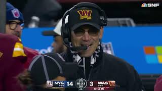 Commanders fan runs on the field but he didn't get very far
