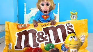 Monkey Baby Bon Bon Goes to Buy Giant M&M Candy and Eats Ice Cream with Puppy in the Garden