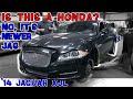 Not another boring car! This '14 Jaguar XJL is anything but boring. CAR WIZARD is very surprised