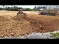 amazing skill technical bulldozer spreading stone and pushing soil u0026 dump truck