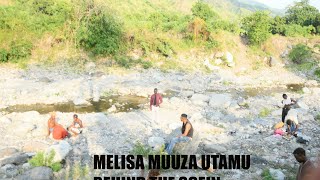 MELISA MUUZA UTAMU BEHIND OF THE SCEIN