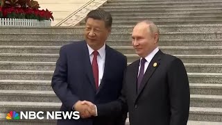 Russia's Putin greeted by Xi Jinping at the start of a two-day visit to China