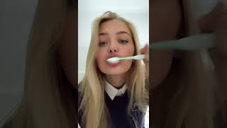 girl brushes teeth