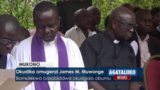 Okuziika omugenzi James M. Muwonge.