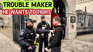 TROUBLE MAKER WANTS TO FIGHT THE POLICE OFFICERS At HORSE GUARDS