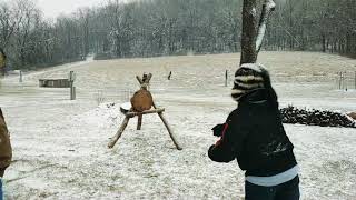 Winter camping tomahawk throwing