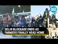 Watch: Farmers in Delhi borders begin journey back home ending year-long protest | Farm laws