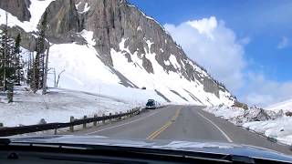 Road from Yellowstone East Entrance to Yellowstone Lake. Snow and geysers. May 2017