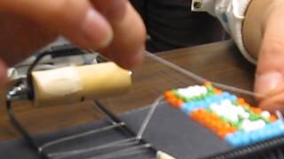 Adding more string on a bead loom weaving