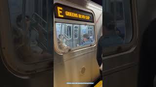 Manhattan bound E Train departing Roosevelt Avenue Jackson Heights IND Subway Station