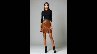 Chic modern elegance in leather skirt ensemble.