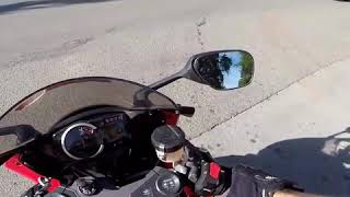 Guy hits motorcycle gets window punched in.