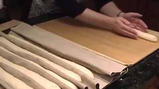 Using a flipping board to transfer baguettes