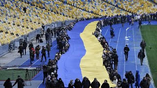 Ukrainians deploy giant national flag to mark 'Unity Day'