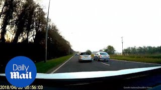 Motorist overtakes car already overtaking in dangerous manoeuvre - Daily Mail