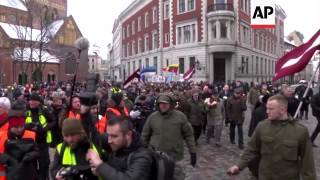 Latvians honor Nazi allies from WWII; pro-Russia counter protest