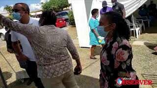 Dr. Christopher Tufton touring the Covid-19 vaccine set up at May pen hospital