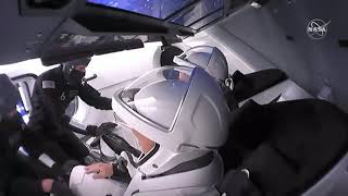 Strapped in and ready to ride: NASA astronauts ready to take off on SpaceX Crew Dragon