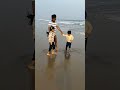 enjoying in beach with father