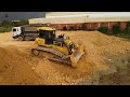 incredible technique. use dump trucks 24t and shantui dh17c2 dozer filling flooded land