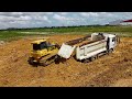 incredible technique. use dump trucks 24t and shantui dh17c2 dozer filling flooded land