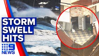 Beachfront homes battered, flood warnings as huge swell forms | 9 News Australia