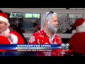 Hundreds of Santas roam Cincinnati for the Santacon Pub Crawl