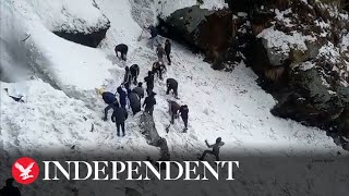 Avalanche sweeps away group of tourists in the Himalayas, killing at least seven