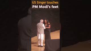 US Singer touches PM Modi's feet