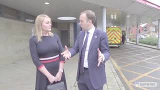 Matt Hancock meets a woman.