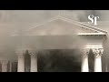 Firefighters battle blaze at South African parliament