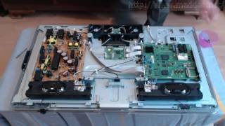 How to open a Philips TV set 9803H to access the T CON board