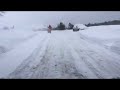 snowblowing the driveway very quickly.