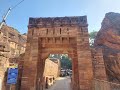 badami cave. shivalaya and jambulingesvara. red sandstone outcrop that surrounds agastya lake.