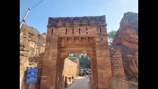 Badami cave. Shivalaya and Jambulingesvara. Red sandstone outcrop that surrounds Agastya lake.