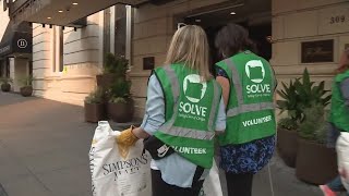 Volunteers comb through downtown Portland streets for SOLVE's second litter cleanup this month