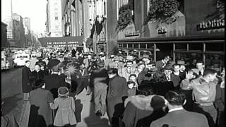 People sit into cars on display at General Motor's Motorama in New York, United S...HD Stock Footage