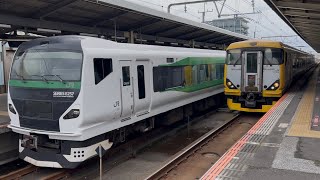 特急わかしお10号東京行き集約臨の返却回送の隣を通過 NB19編成