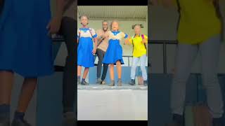 Spanish teacher and his students dance