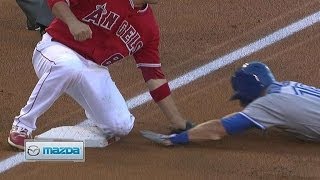 TOR@LAA: Iannetta throws out Tolleson at third base