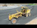 powerful mitsubishi grader trimming gravel installation new roads activity grader spreading gravel